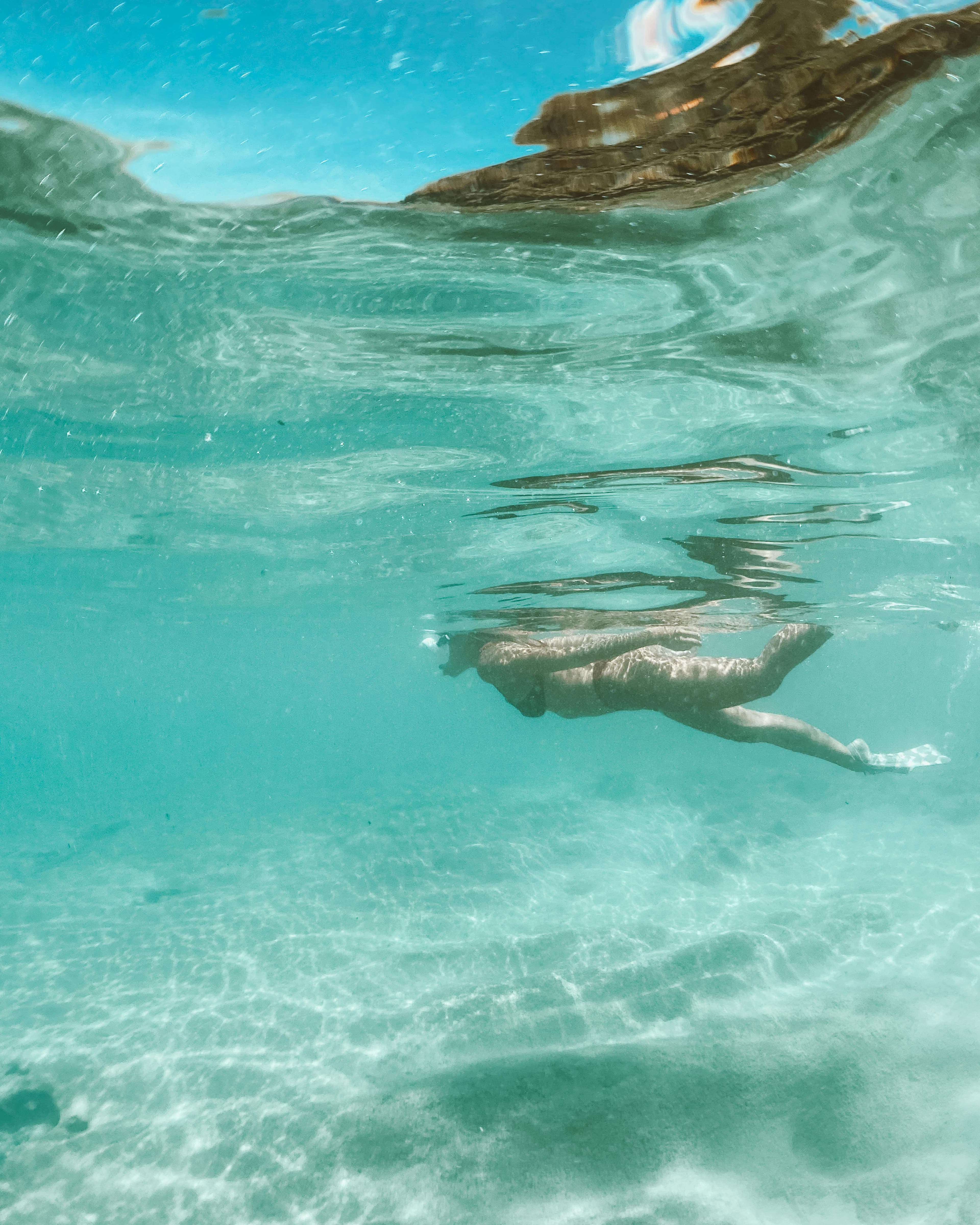 Snorkeling in the crystal clear waters of Oahu
